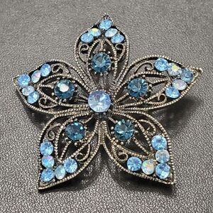 Annaleece by Devries dark silver tone blue flower brooch